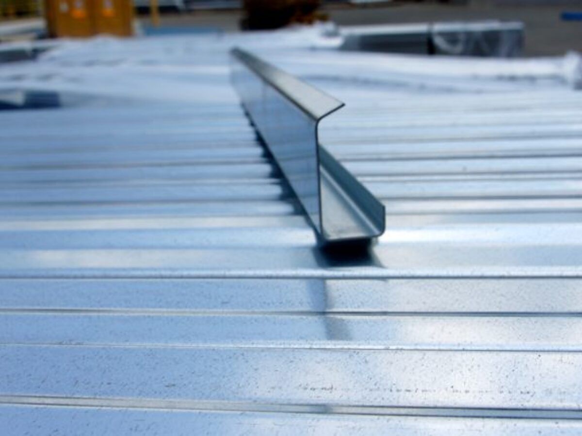 Galvanized zee channel resting on corrugated metal decking